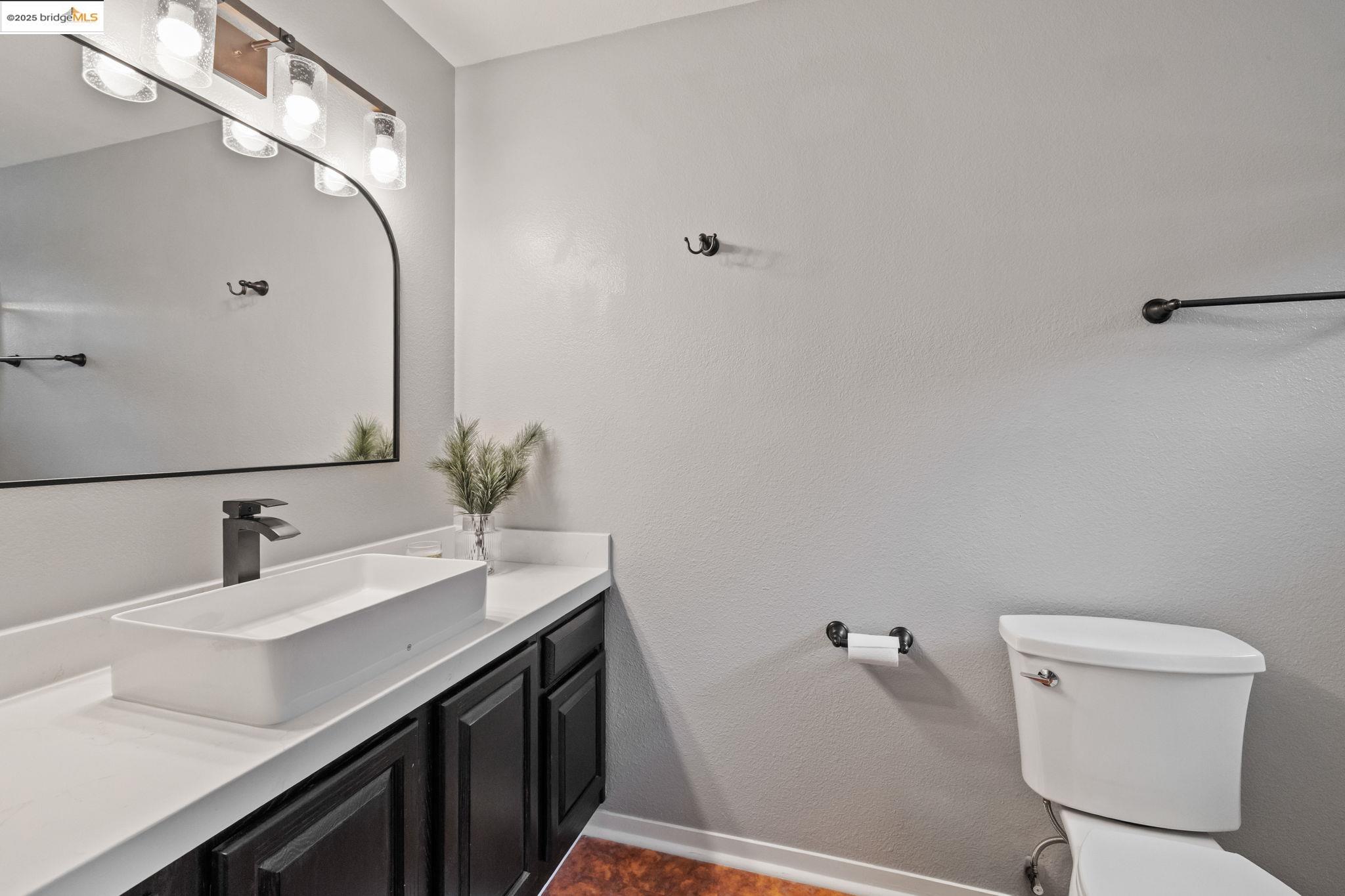 18080 Little Fuller Road Twain Harte, CA 95383 - Photo 25 of 40 Bathroom featuring vanity and a textured wall
