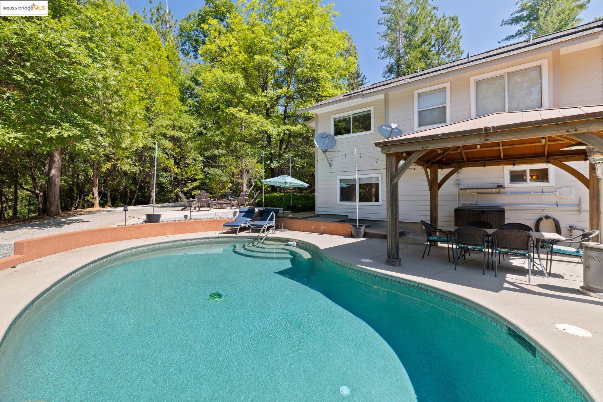 18080 Little Fuller Road Twain Harte, CA 95383 - Photo 30 of 40 Outdoor pool featuring a patio, a gazebo, and outdoor dining area