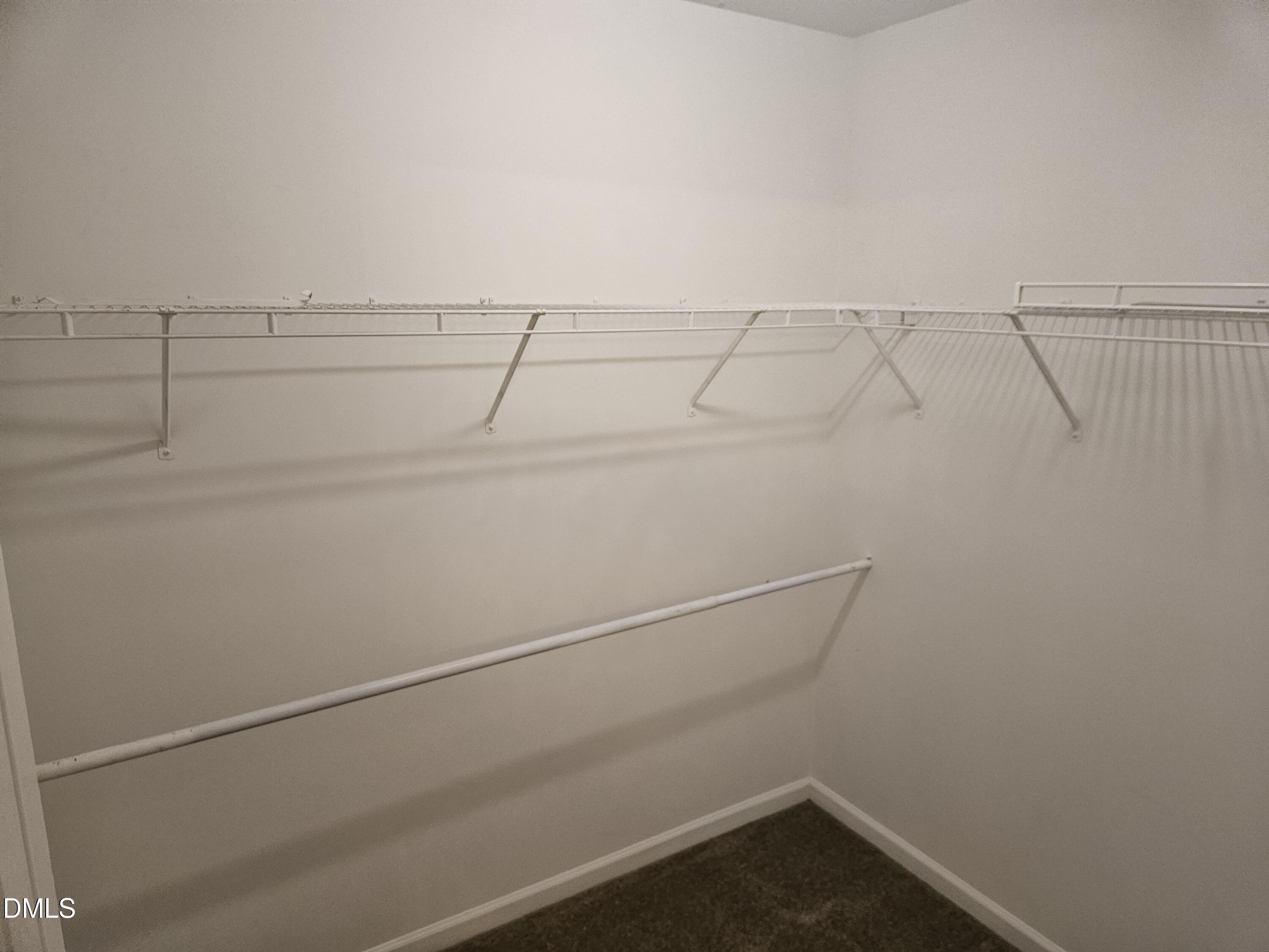 9904 Layla Avenue Raleigh, NC 27617 - Photo 12 of 19 a view of a room with racks on the wall