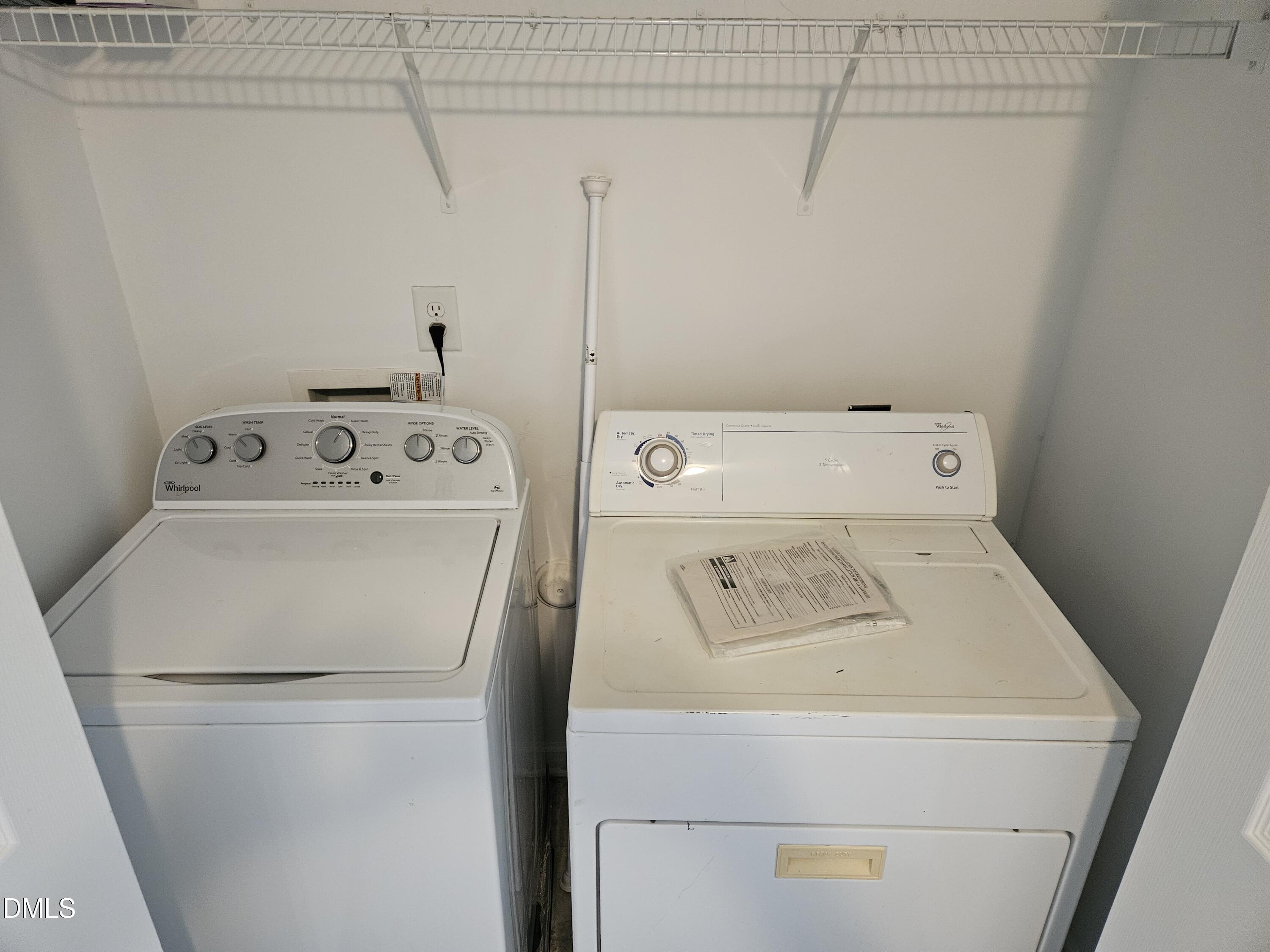 9904 Layla Avenue Raleigh, NC 27617 - Photo 18 of 19 a utility room with dryer and washer