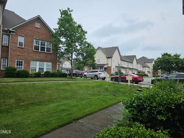 a house view with a garden space