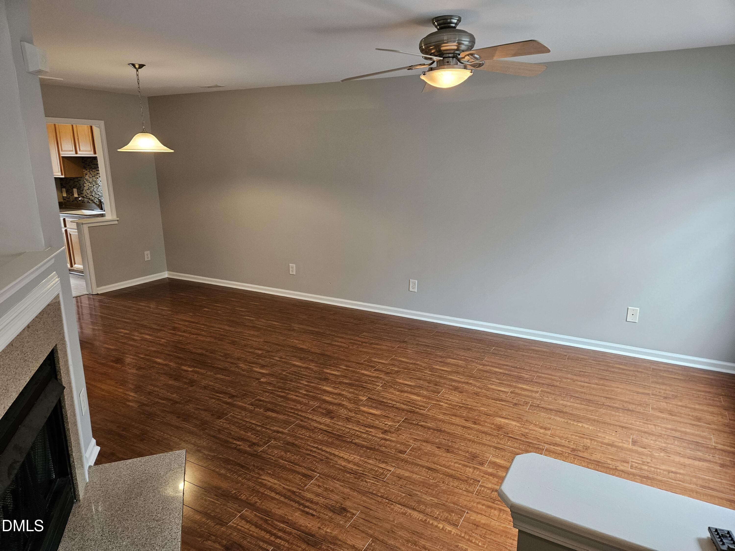 9904 Layla Avenue Raleigh, NC 27617 - Photo 4 of 19 a view of room with window and ceiling fan
