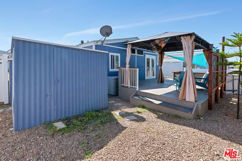 a house view with a backyard space