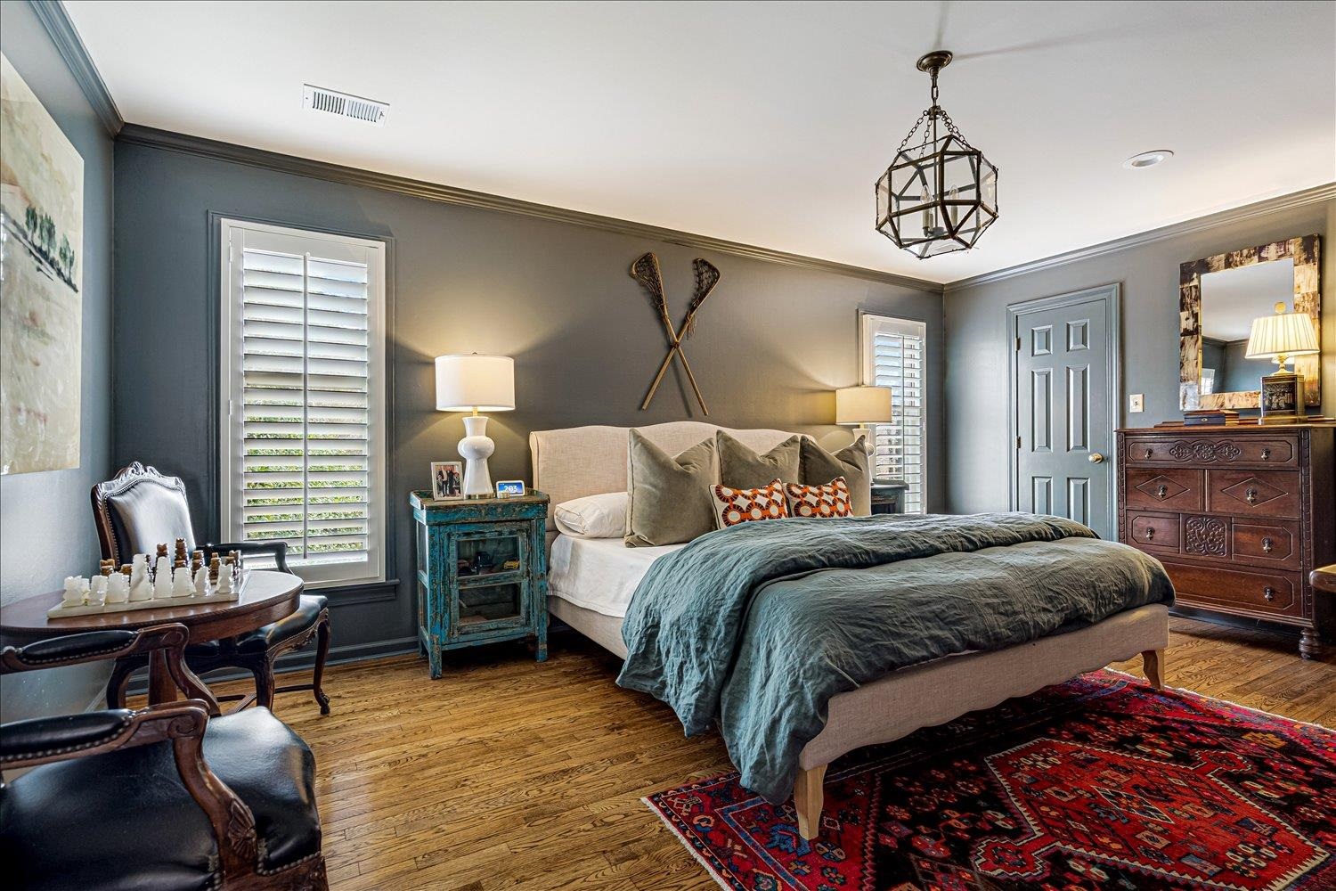 485 River Ridge Cove Memphis, TN 38120 - Photo 23 of 33 Bedroom featuring ornamental molding and wood finished floors and private bathroom
