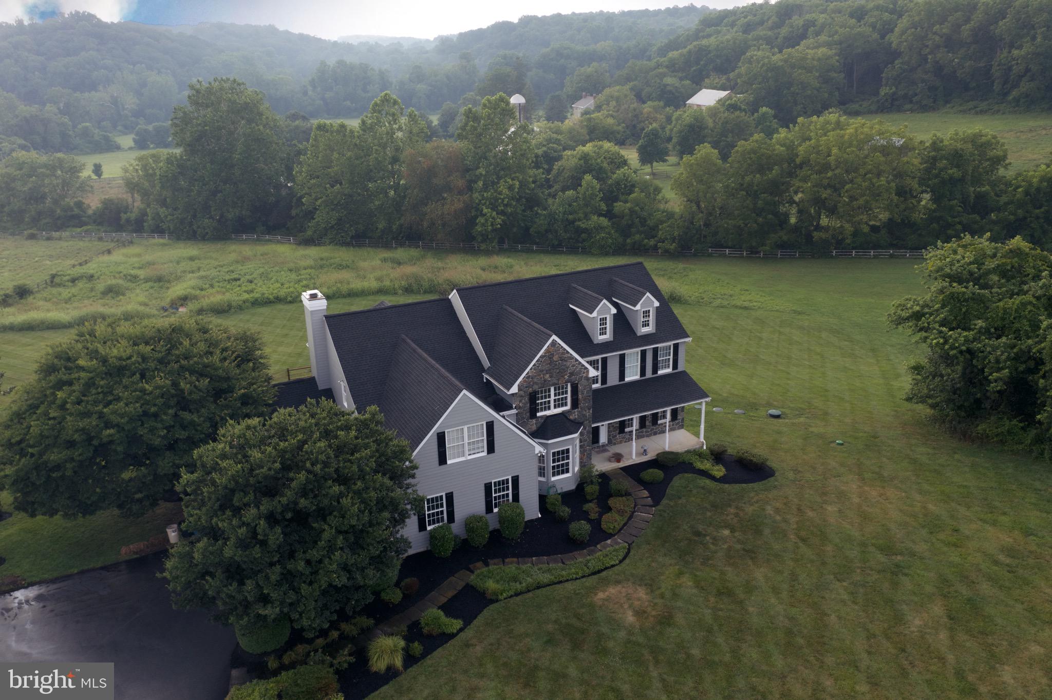 106 Sawmill Road Landenberg, PA 19350 - Photo 3 of 4 an aerial view of a house