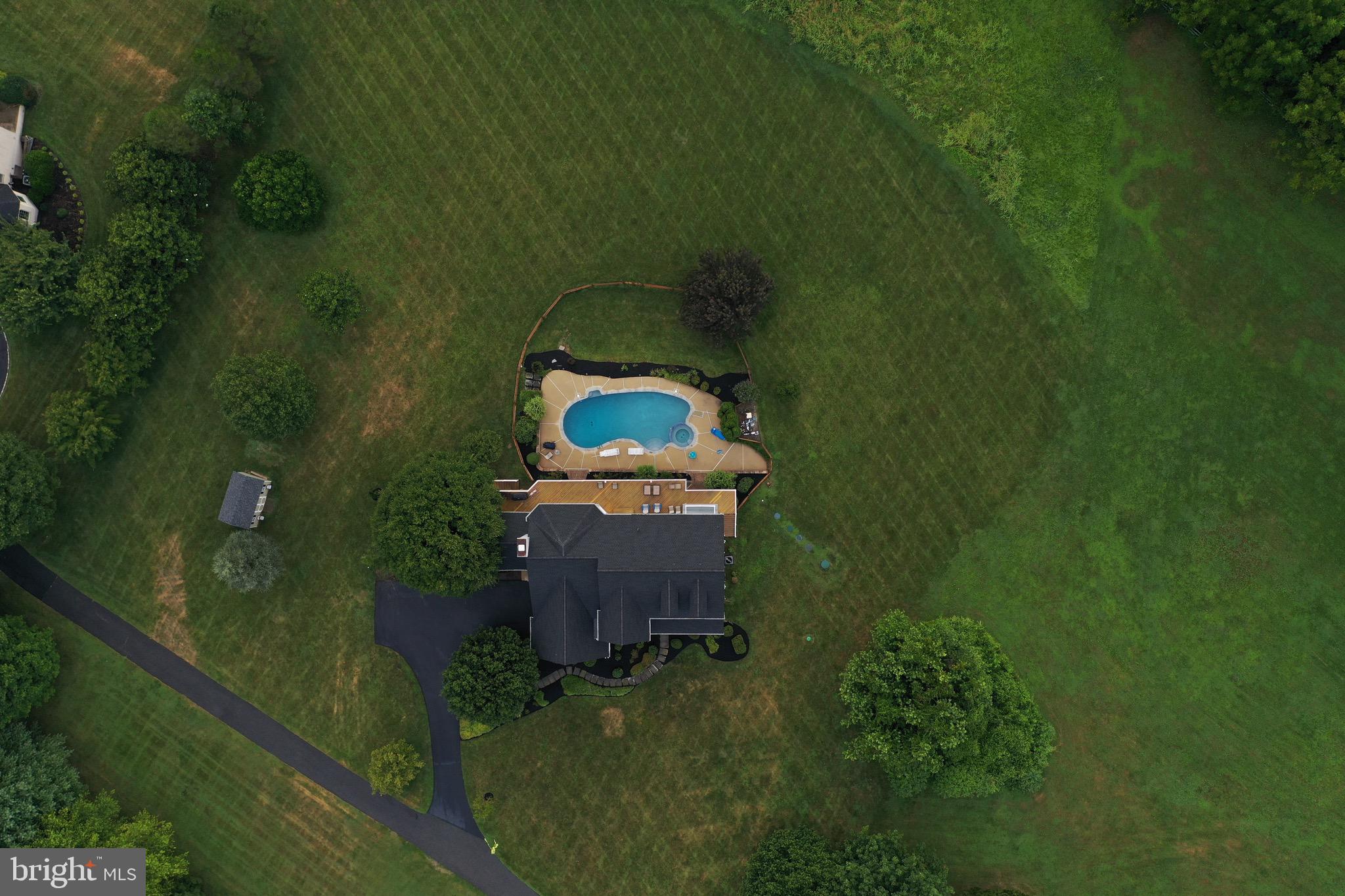106 Sawmill Road Landenberg, PA 19350 - Photo 4 of 4 an aerial view of a house with a yard
