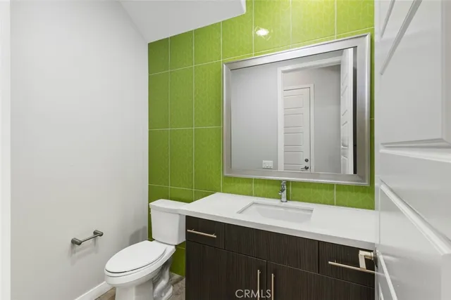 a view of hallway with stairs and wooden floor
