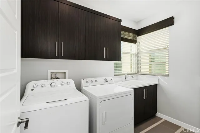 a view of a swimming pool with a lawn chairs