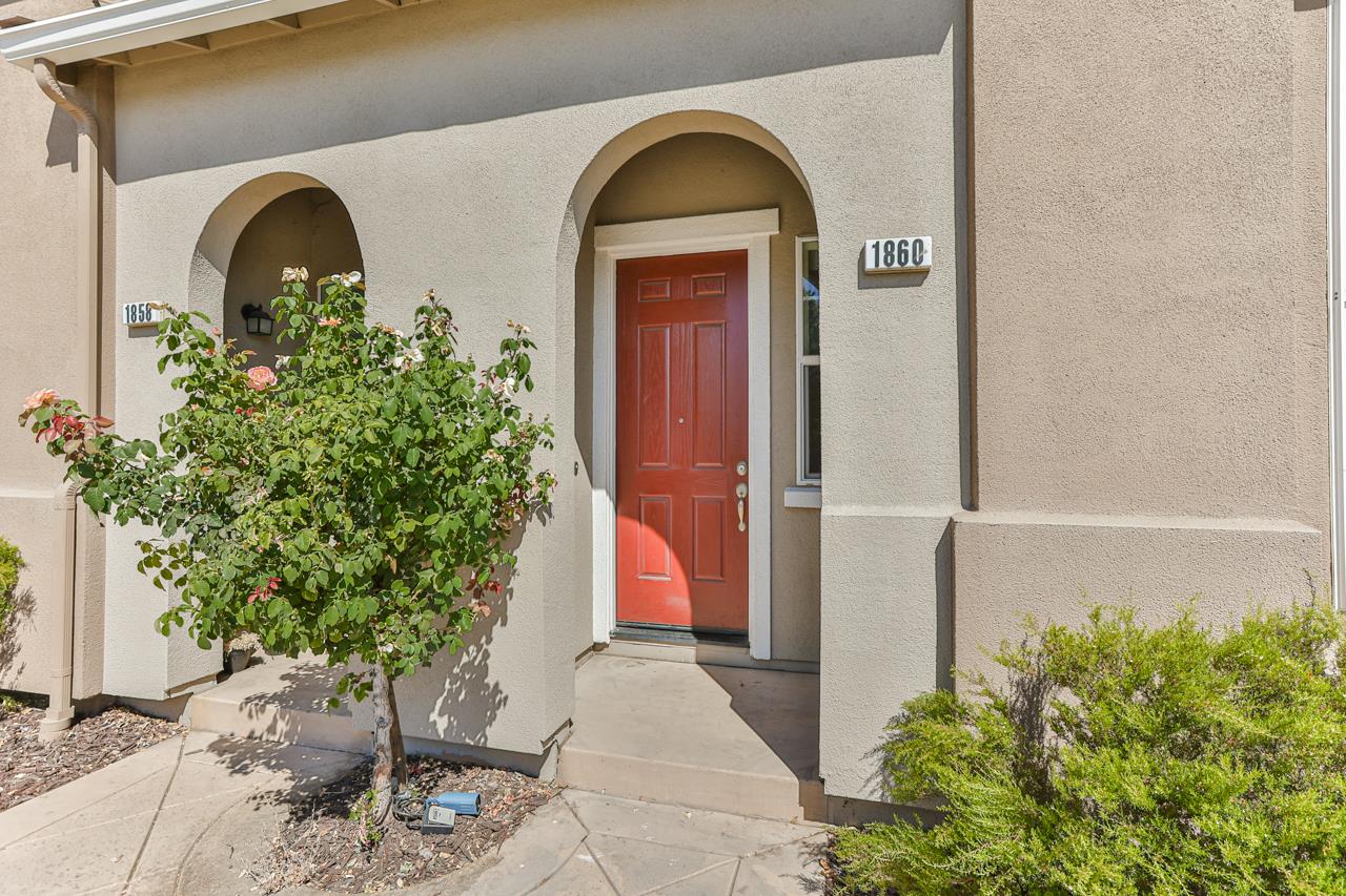 1860 Snell Place Milpitas, CA 95035 - Photo 4 of 37 a front view of a house with a garden