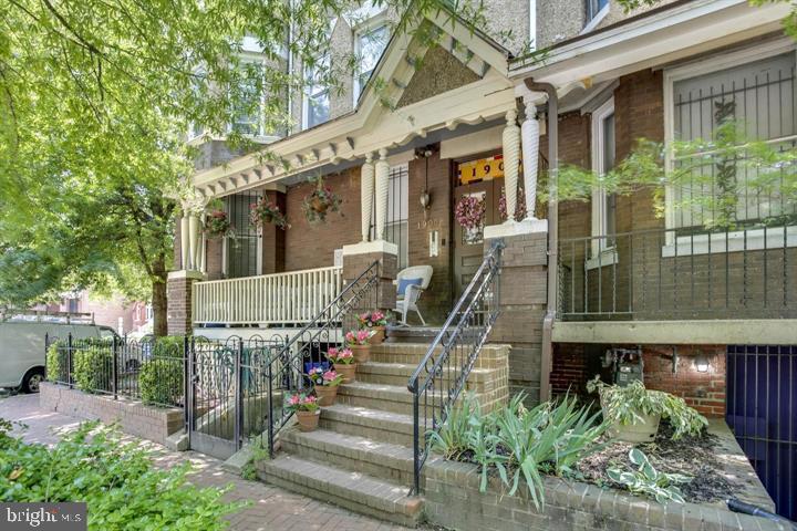 1900 3rd Street Northwest, Unit 2 Washington, DC 20001 - Photo 1 of 14 front view of a house with a small yard