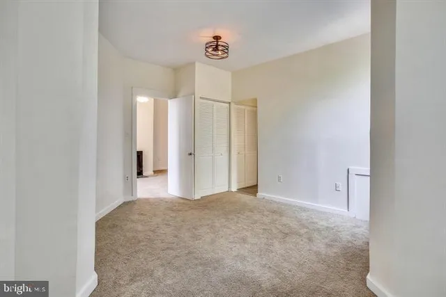 a view of a room with an empty space