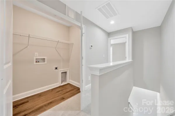 a bathroom with a sink toilet and vanity