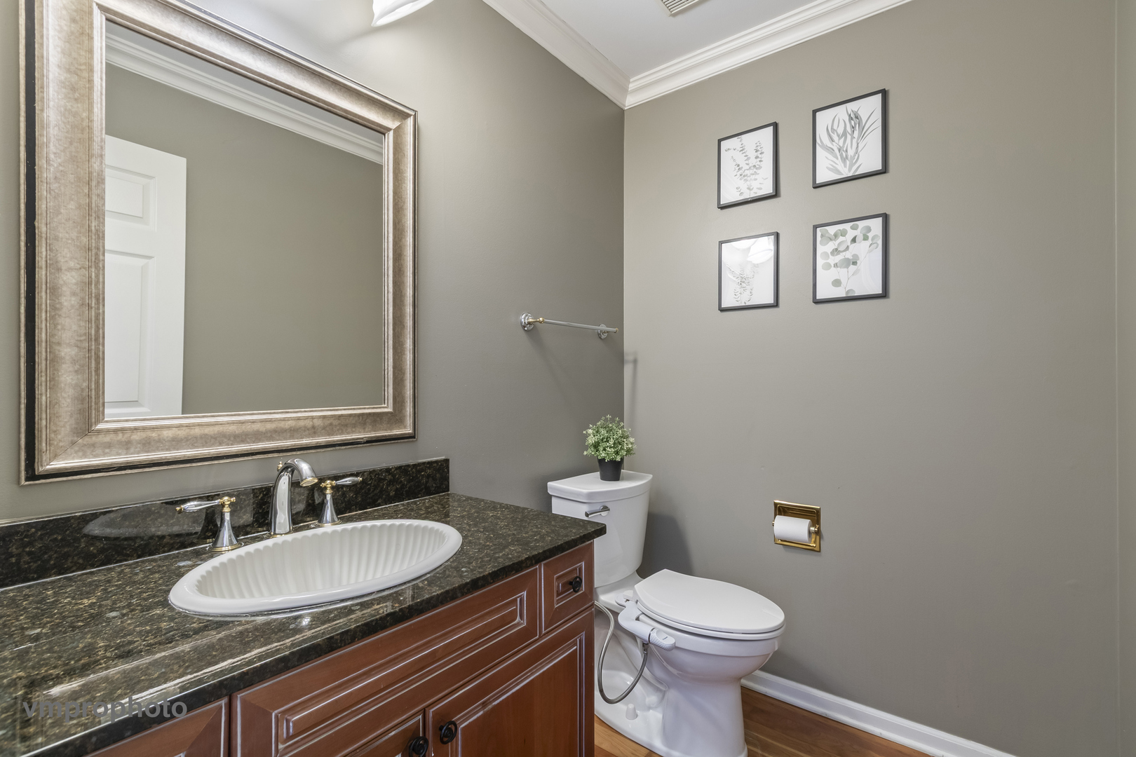 246 Montclair Road Vernon Hills, IL 60061 - Photo 16 of 50 a bathroom with a granite countertop toilet sink and mirror