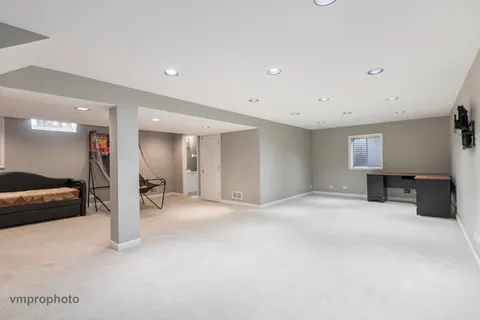 a view of a livingroom with a car parked in it