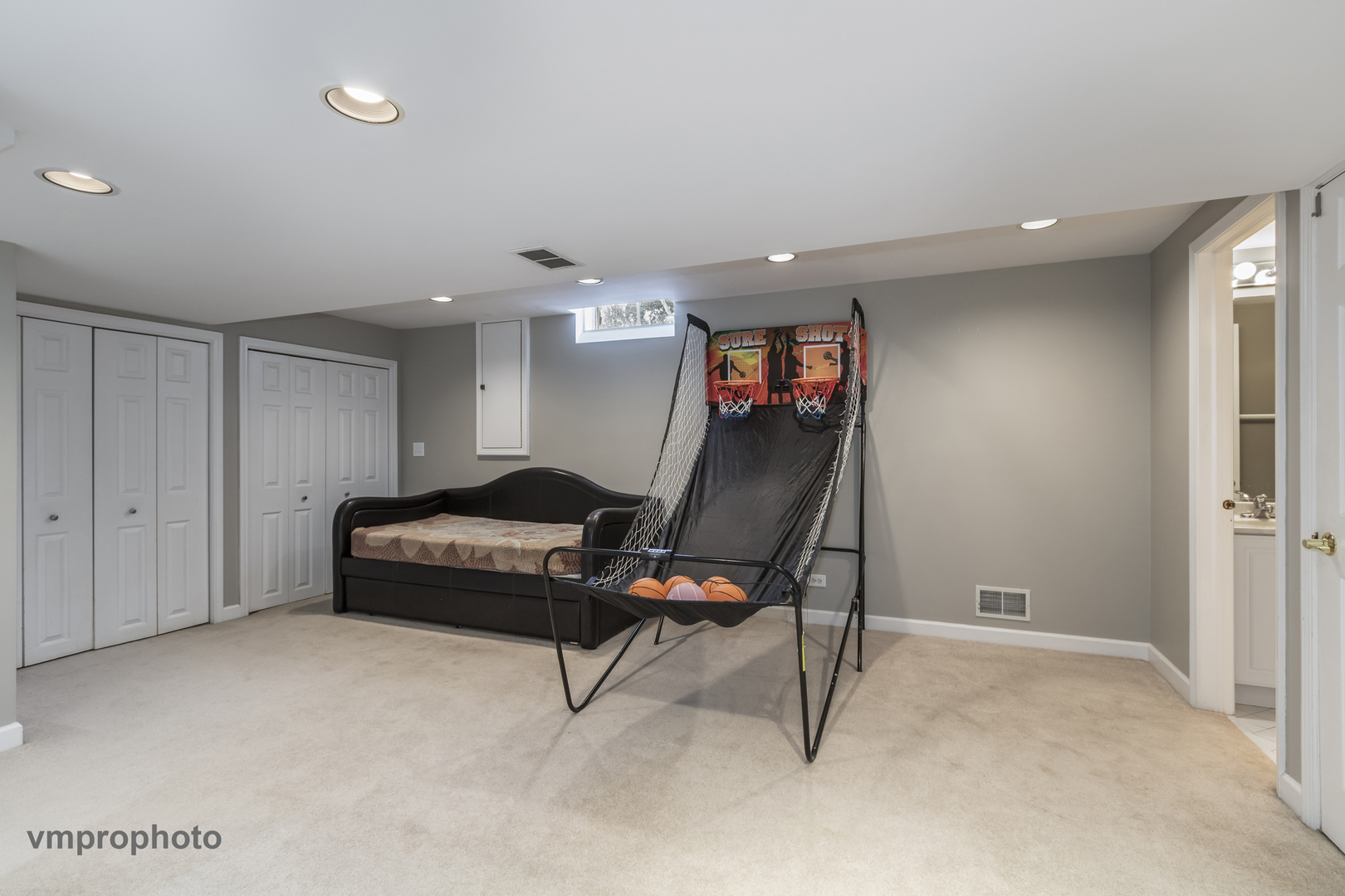 246 Montclair Road Vernon Hills, IL 60061 - Photo 37 of 50 a bedroom with furniture and a air conditioner vent