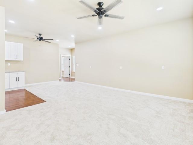 910 Cream Level Road Athens, TX 75751 - Photo 30 of 40 an empty room with a ceiling fan and a window