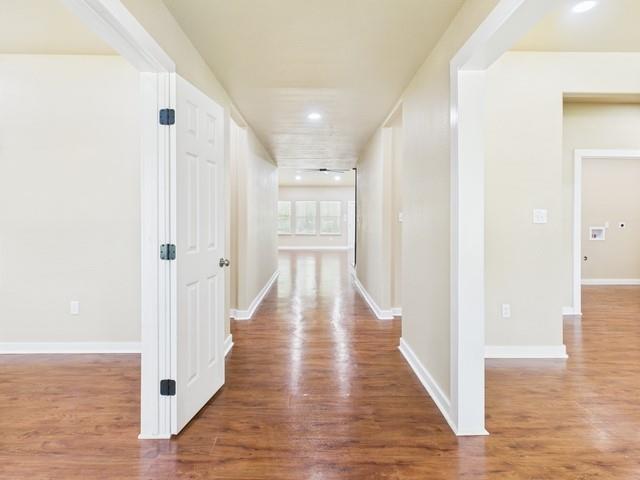 910 Cream Level Road Athens, TX 75751 - Photo 3 of 40 a view of a hallway with wooden floor