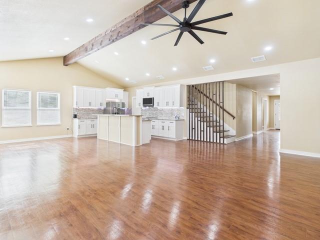 910 Cream Level Road Athens, TX 75751 - Photo 7 of 40 a view of a kitchen with a refrigerator and a window
