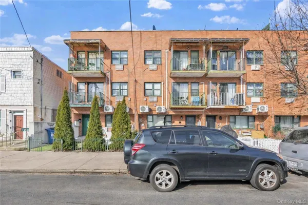 a car parked in front of a building