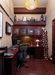 a workspace with furniture and lamp