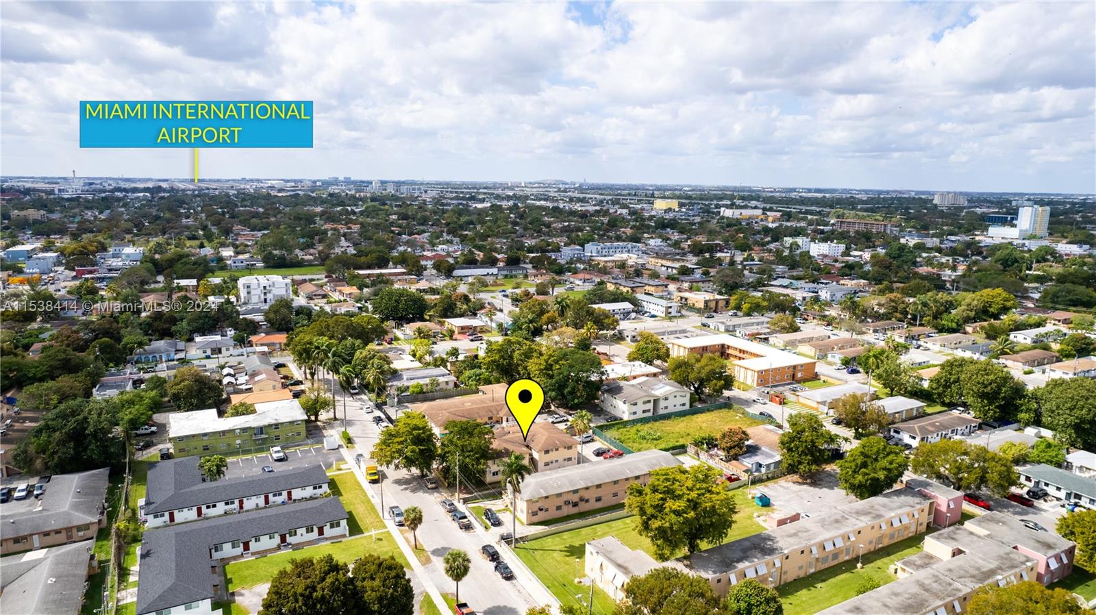 1945 Northwest 29th Street, Unit 8 Miami, FL 33142 - Photo 2 of 31 an aerial view of multiple house
