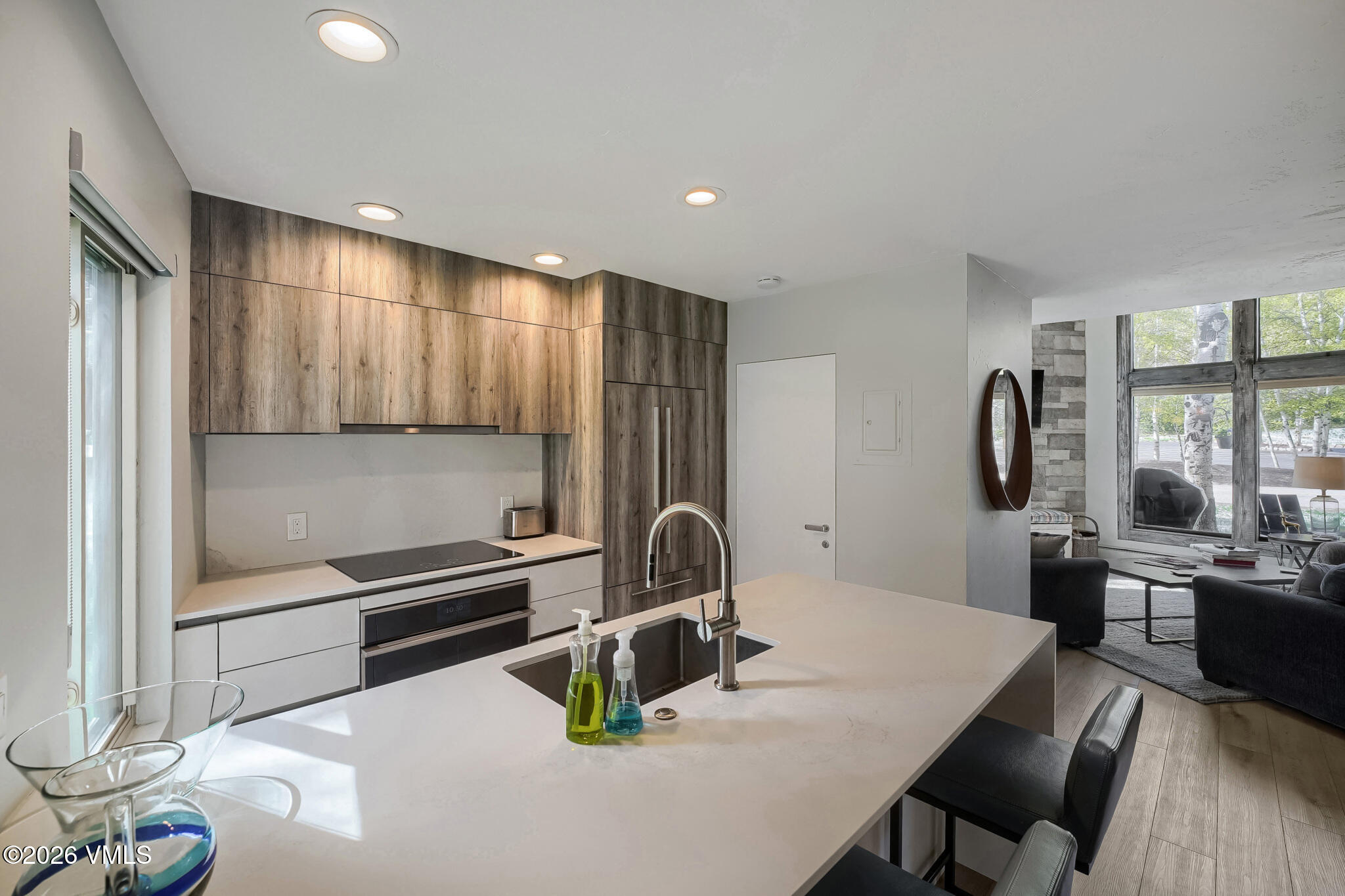 142 Eagle Drive, Unit C1 Avon, CO 81620 - Photo 7 of 20 a kitchen with a sink appliances and cabinets