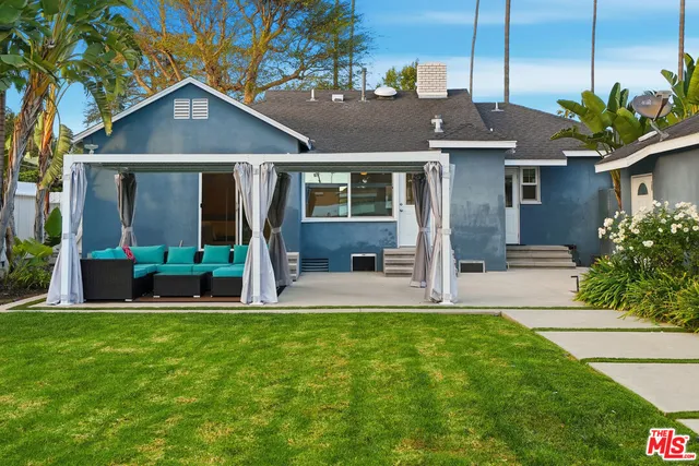 a view of a house with a street