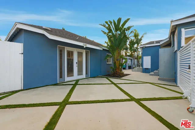 a view of a house with a street