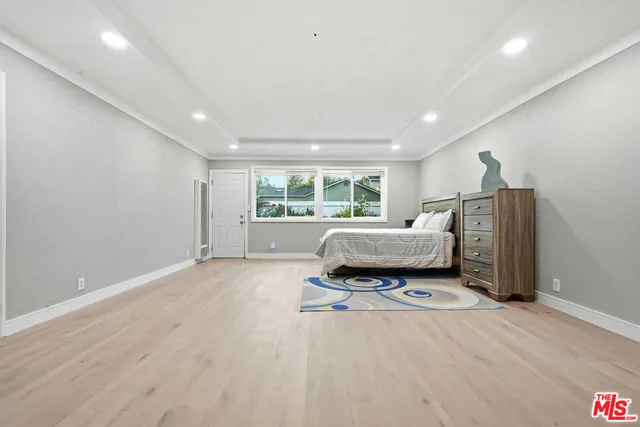 a bathroom with a shower and a sink