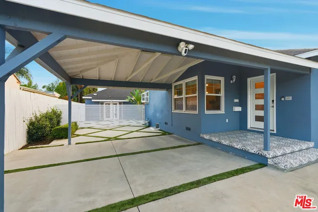 a view of a house with porch and sitting area