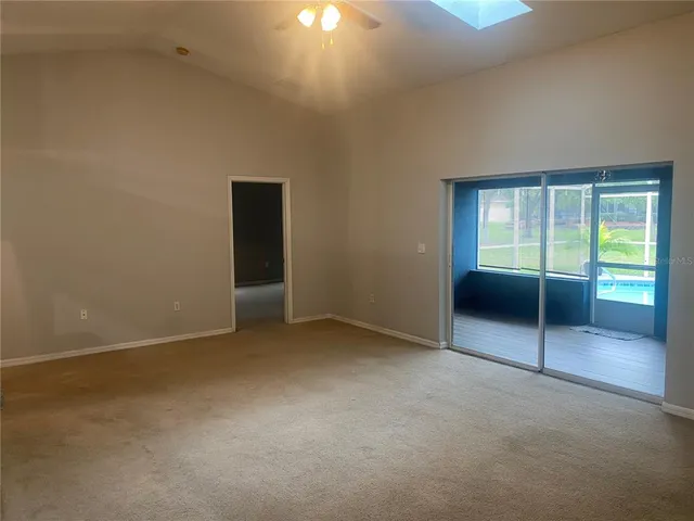 an empty room with a sliding door
