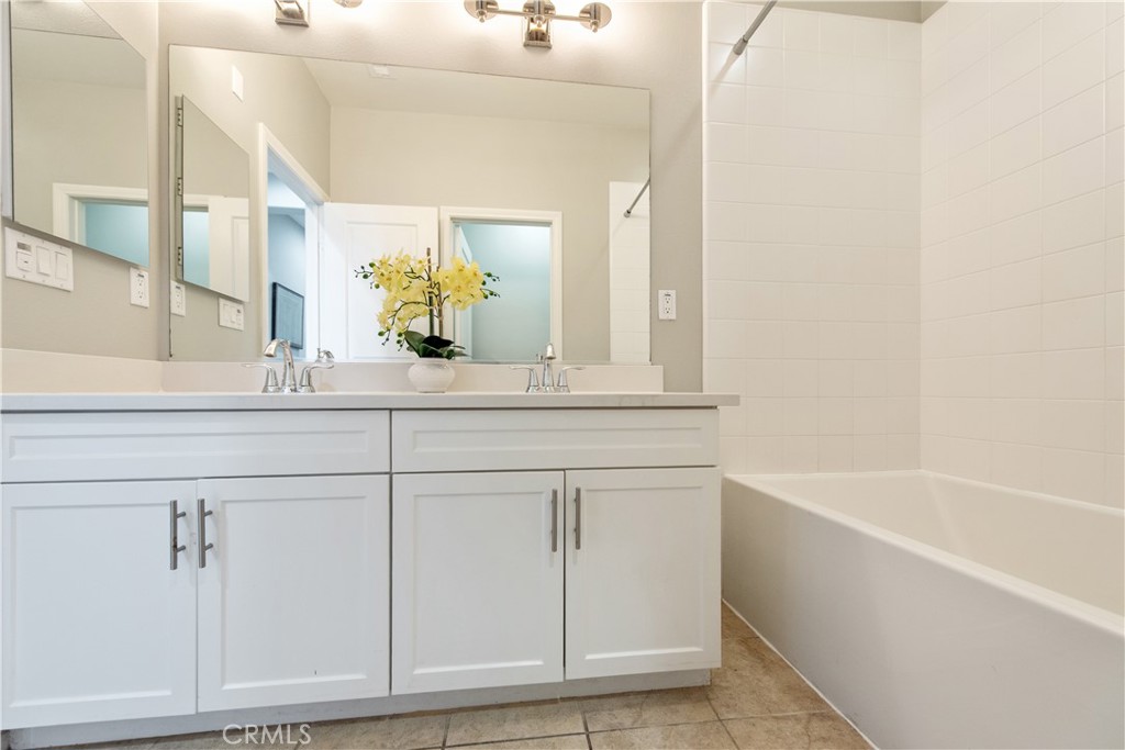 68 Origin Irvine, CA 92618 - Photo 37 of 43 a bathroom with a bathtub and a sink