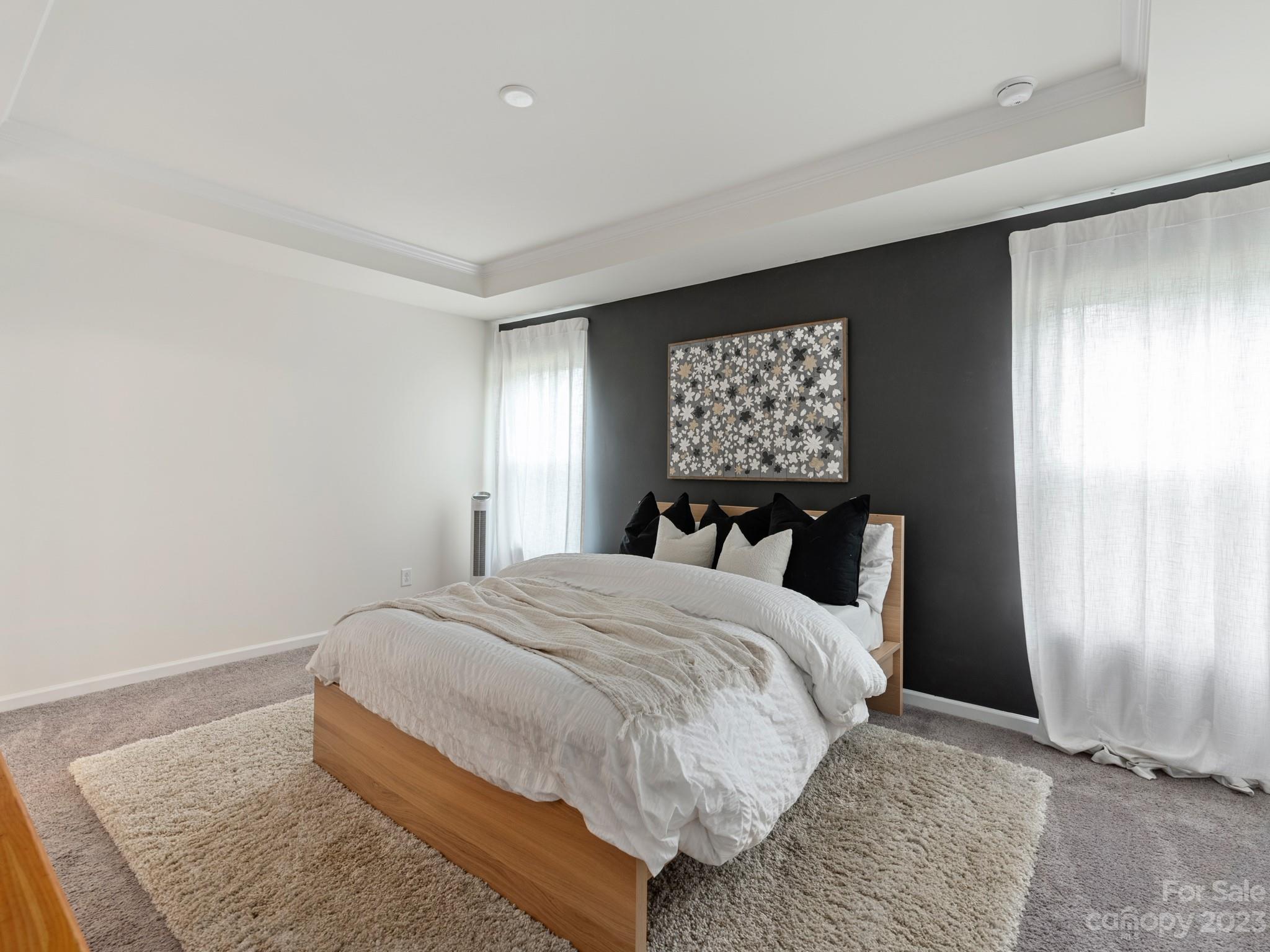 225 Quinn Road Matthews, NC 28104 - Photo 15 of 24 a bedroom with a bed and a window