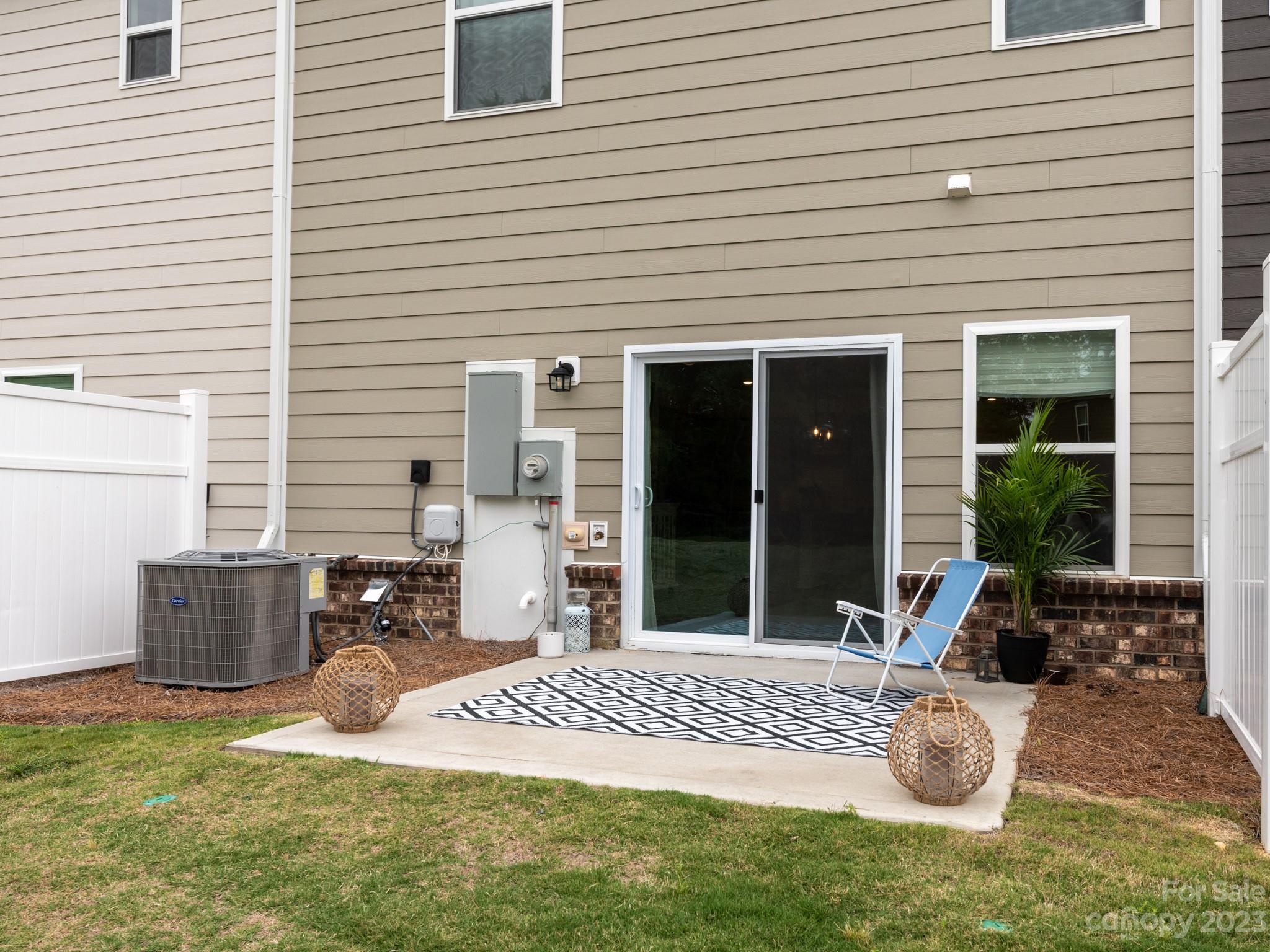 225 Quinn Road Matthews, NC 28104 - Photo 22 of 24 a backyard of a house with seating space