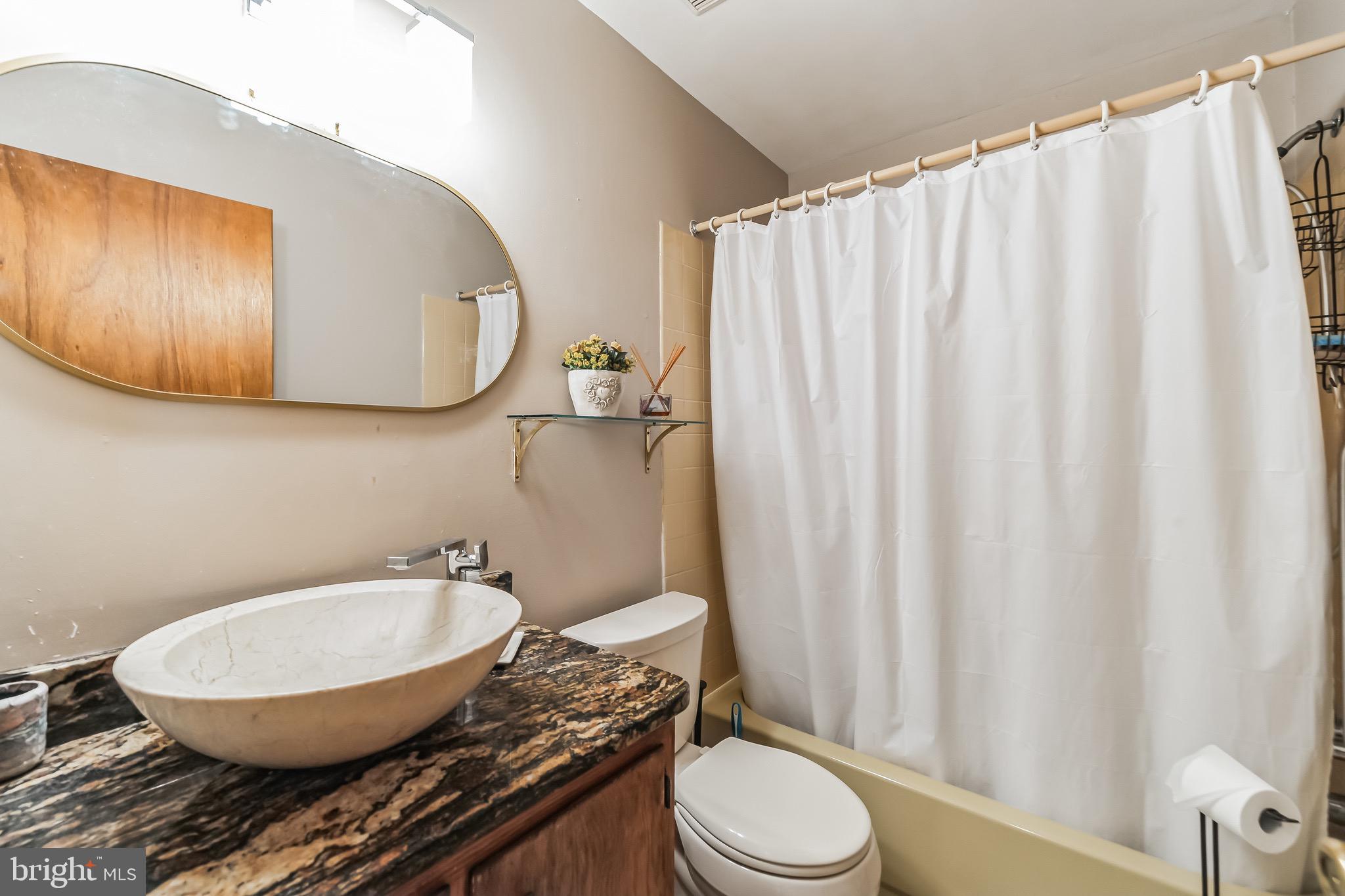 4500 Bethel Road Upper Chichester, PA 19061 - Photo 19 of 36 Hall Bathroom with a fancy sink.
