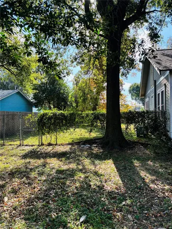 a view of backyard with green space