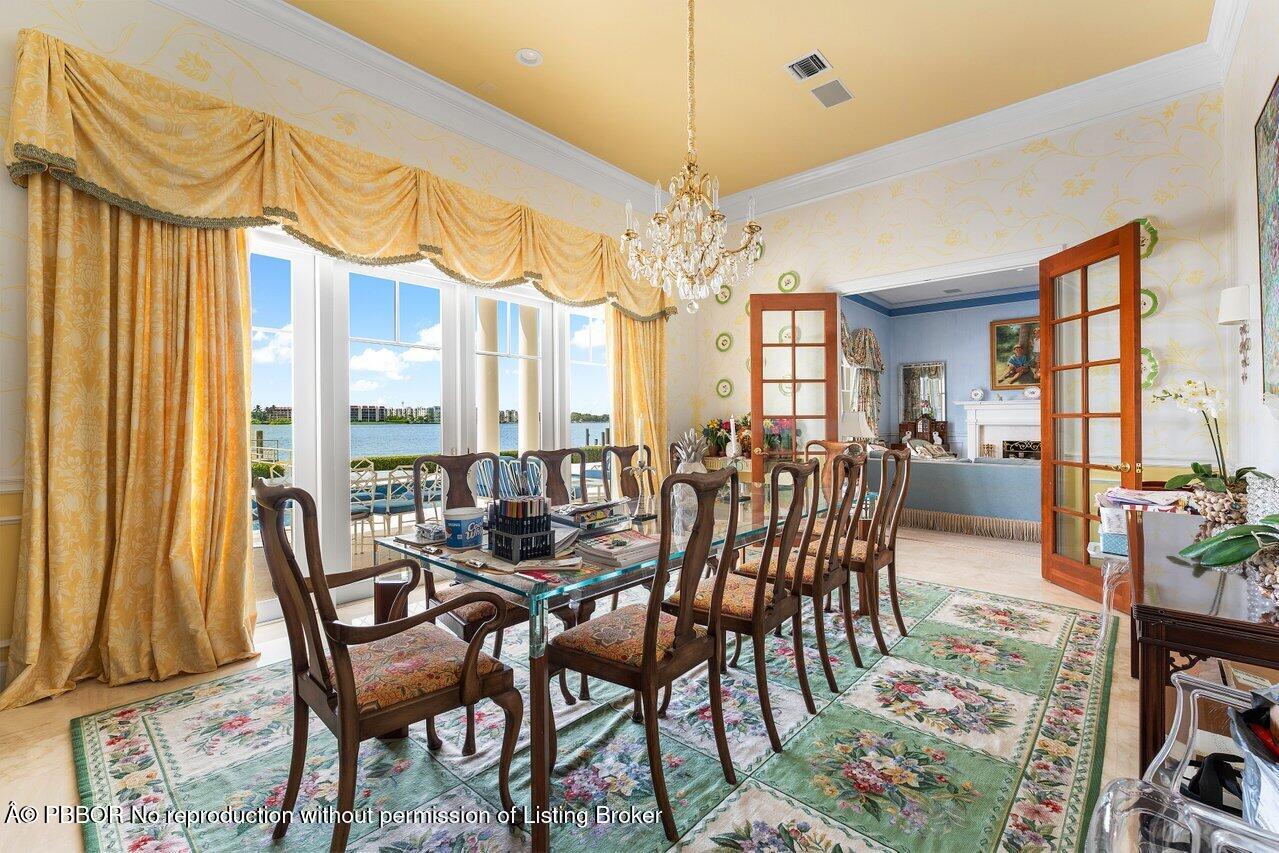 1275 Lands End Road Lake Worth, FL 33462 - Photo 14 of 83 a view of a dining room with furniture window and outside view
