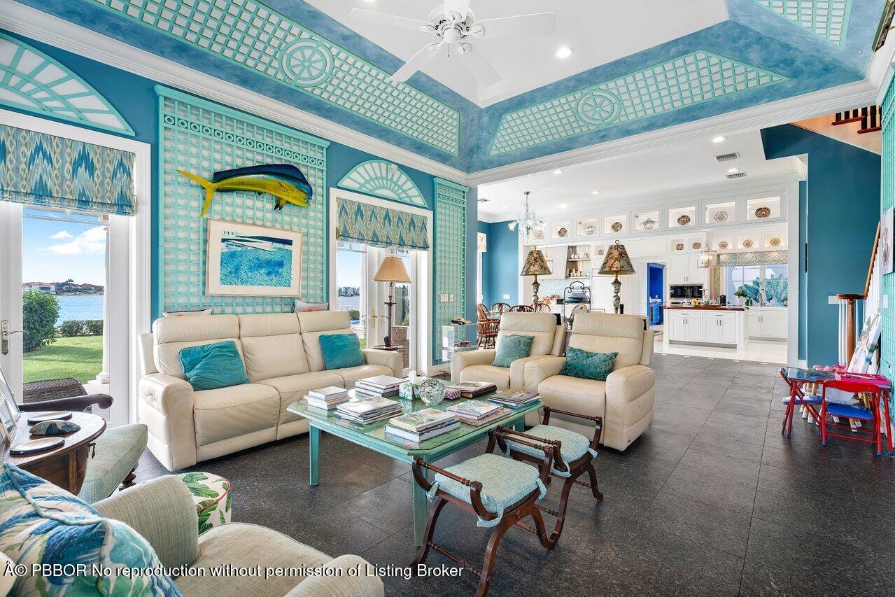 1275 Lands End Road Lake Worth, FL 33462 - Photo 22 of 83 a living room with furniture and a large window