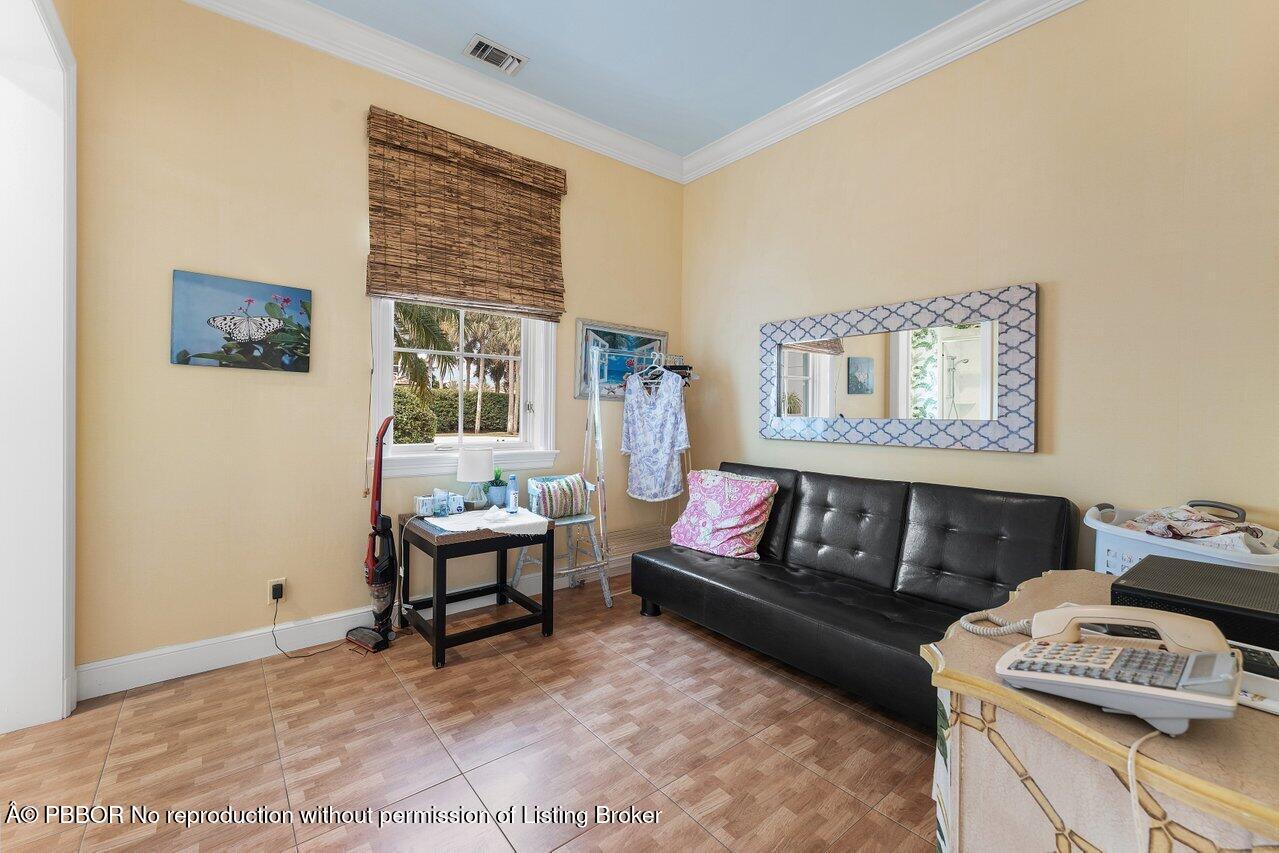 1275 Lands End Road Lake Worth, FL 33462 - Photo 28 of 83 a living room with furniture and a window