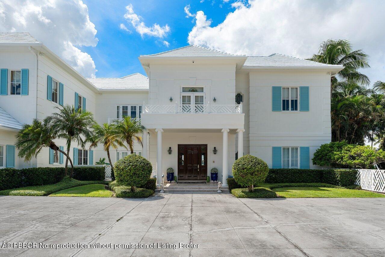 1275 Lands End Road Lake Worth, FL 33462 - Photo 3 of 83 a view of a house with a yard and potted plants