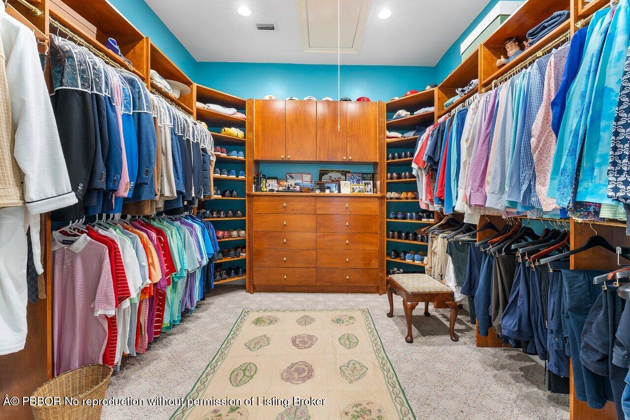 1275 Lands End Road Lake Worth, FL 33462 - Photo 37 of 83 a view of walk in closet with clothes and shoes