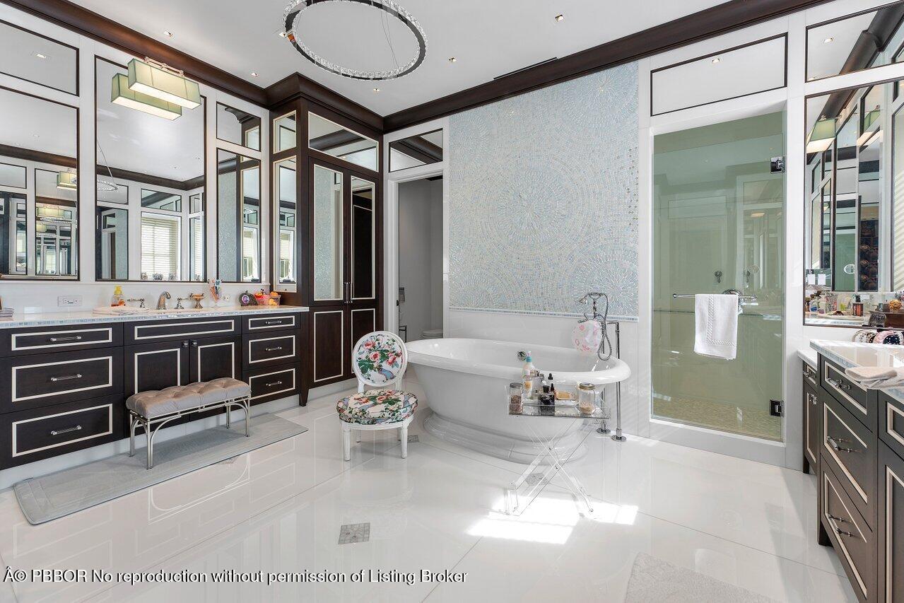 1275 Lands End Road Lake Worth, FL 33462 - Photo 39 of 83 a living room with furniture a fireplace and a large window