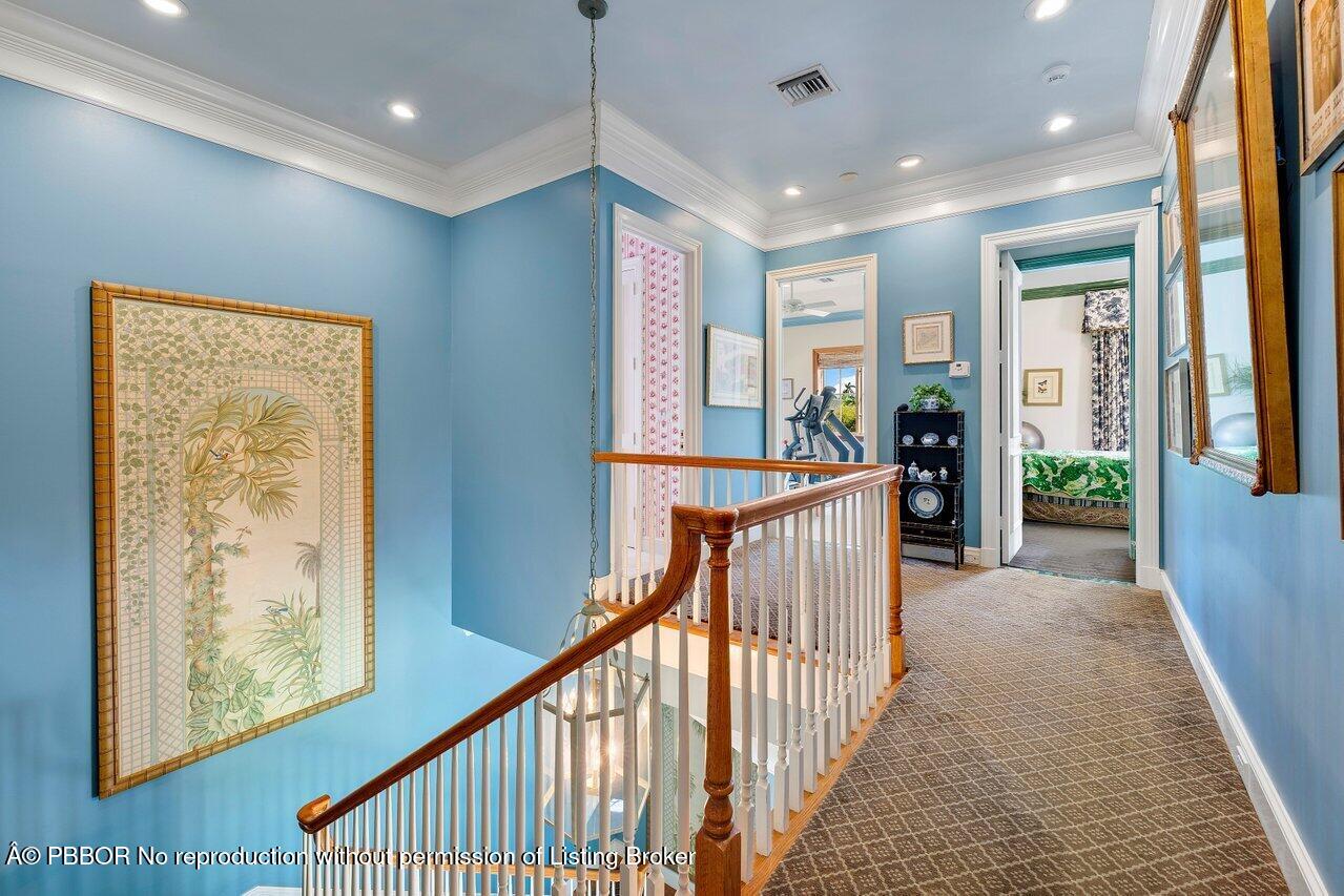 1275 Lands End Road Lake Worth, FL 33462 - Photo 52 of 83 a view of a hallway with furniture
