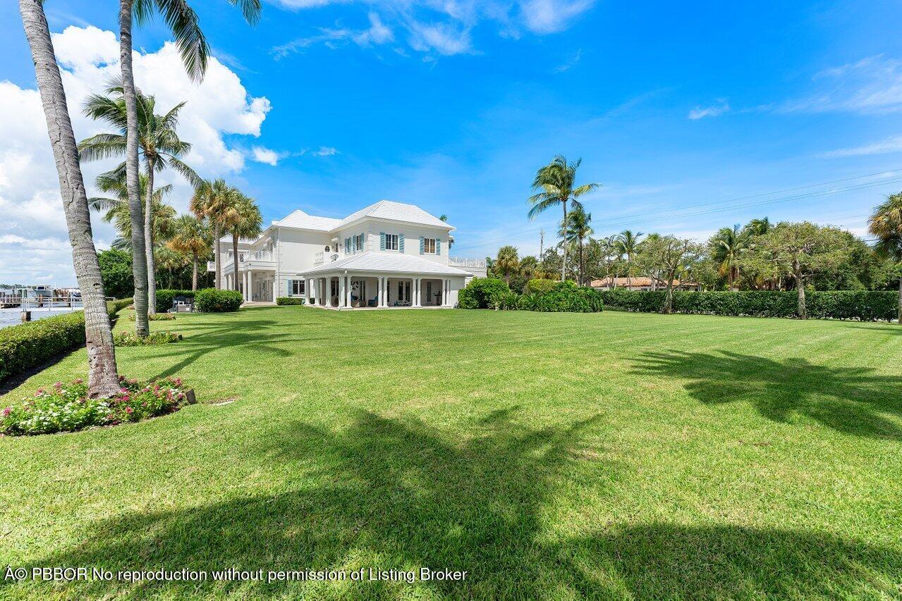 1275 Lands End Road Lake Worth, FL 33462 - Photo 61 of 83 a view of a house with a big yard