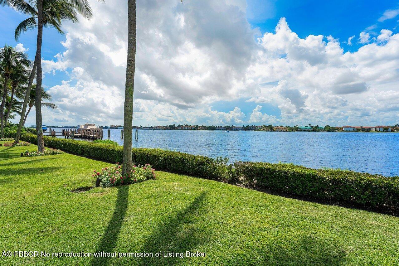 1275 Lands End Road Lake Worth, FL 33462 - Photo 62 of 83 a view of a lake with a big yard