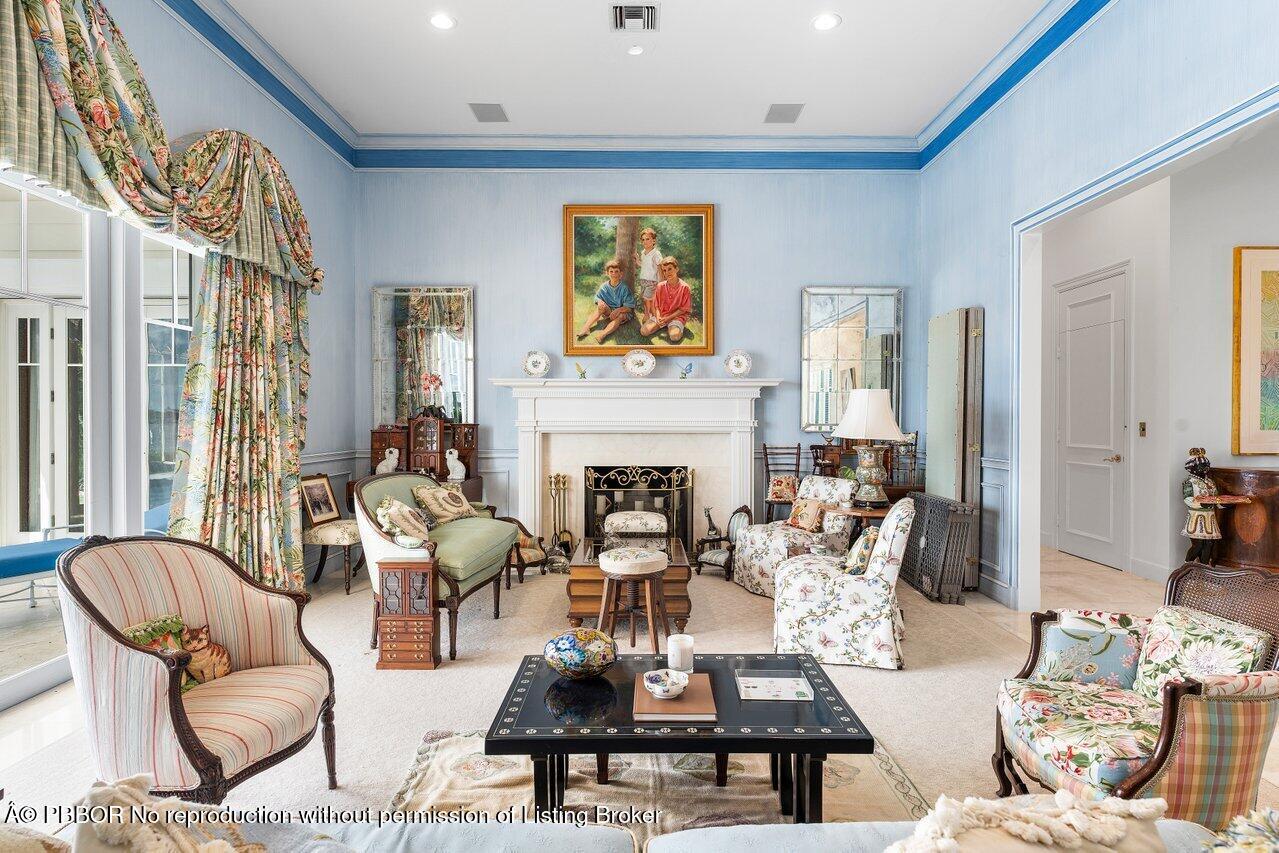 1275 Lands End Road Lake Worth, FL 33462 - Photo 8 of 83 a living room with fireplace furniture and a large window