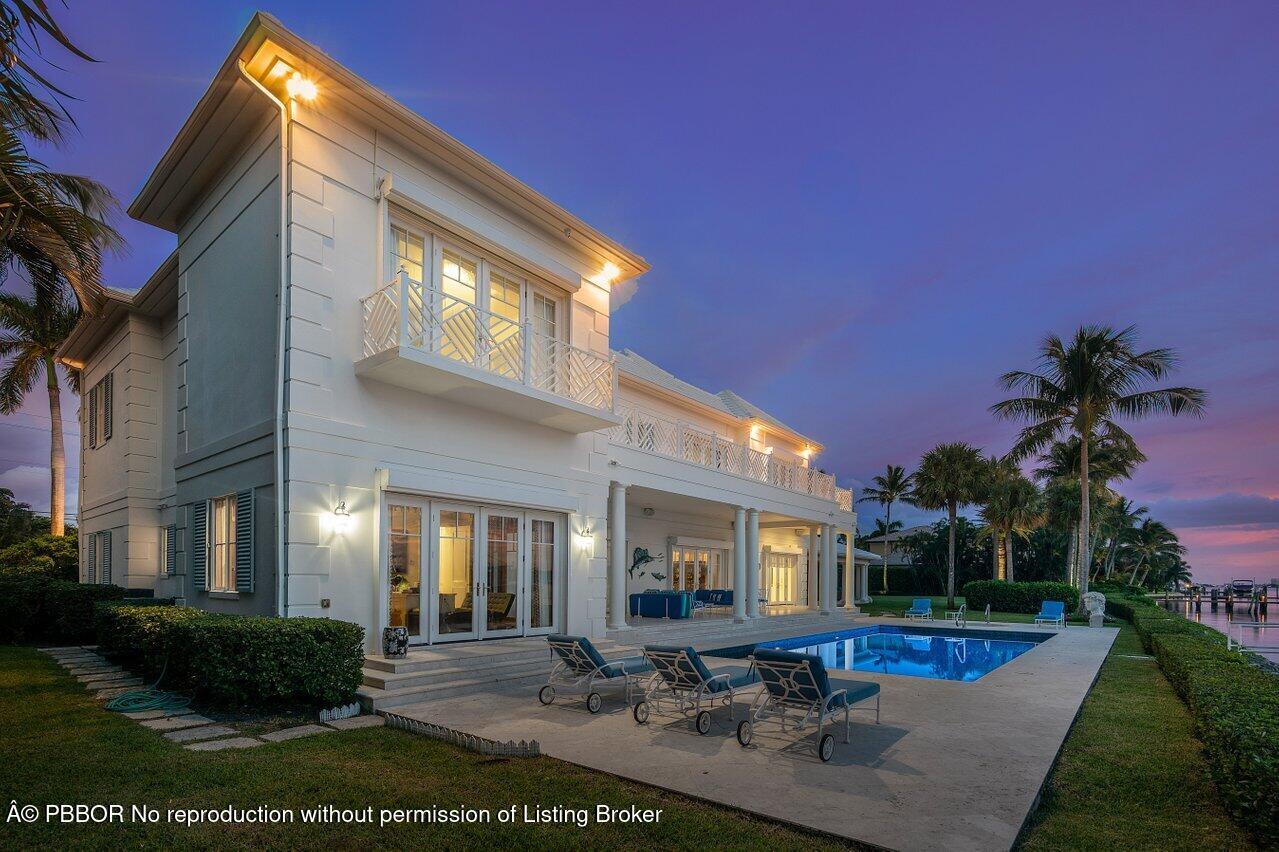 1275 Lands End Road Lake Worth, FL 33462 - Photo 81 of 83 a view of a house with a patio