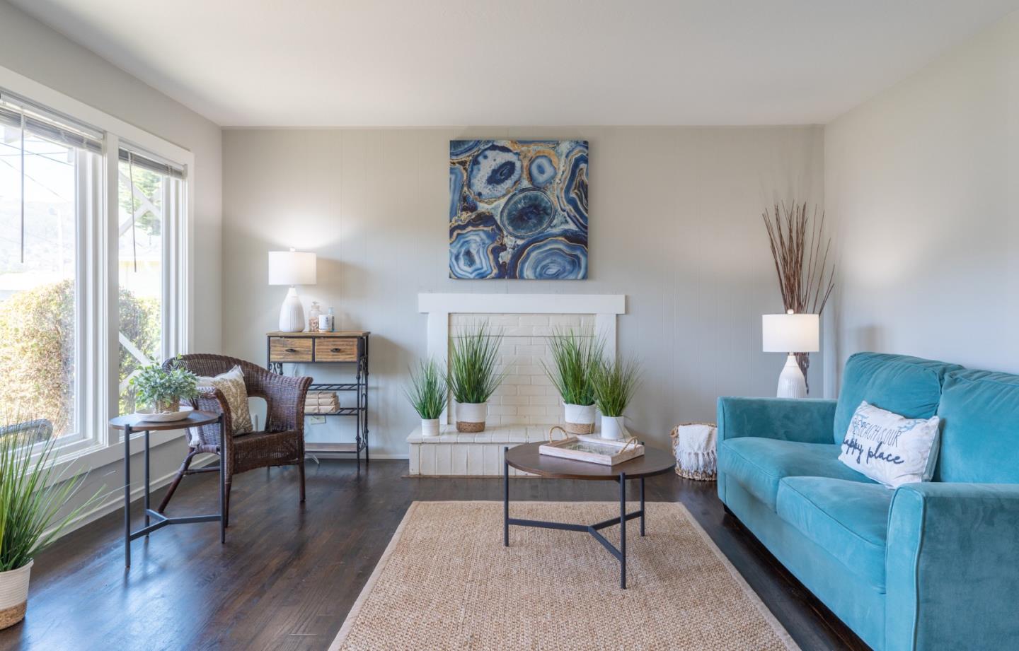 1063 Anza Drive Pacifica, CA 94044 - Photo 4 of 10 a living room with furniture and wooden floor