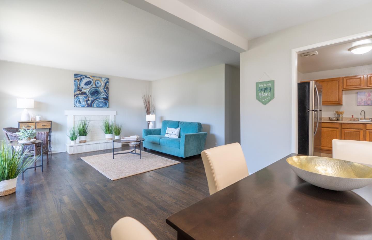 1063 Anza Drive Pacifica, CA 94044 - Photo 6 of 10 a living room with furniture and a wooden floor