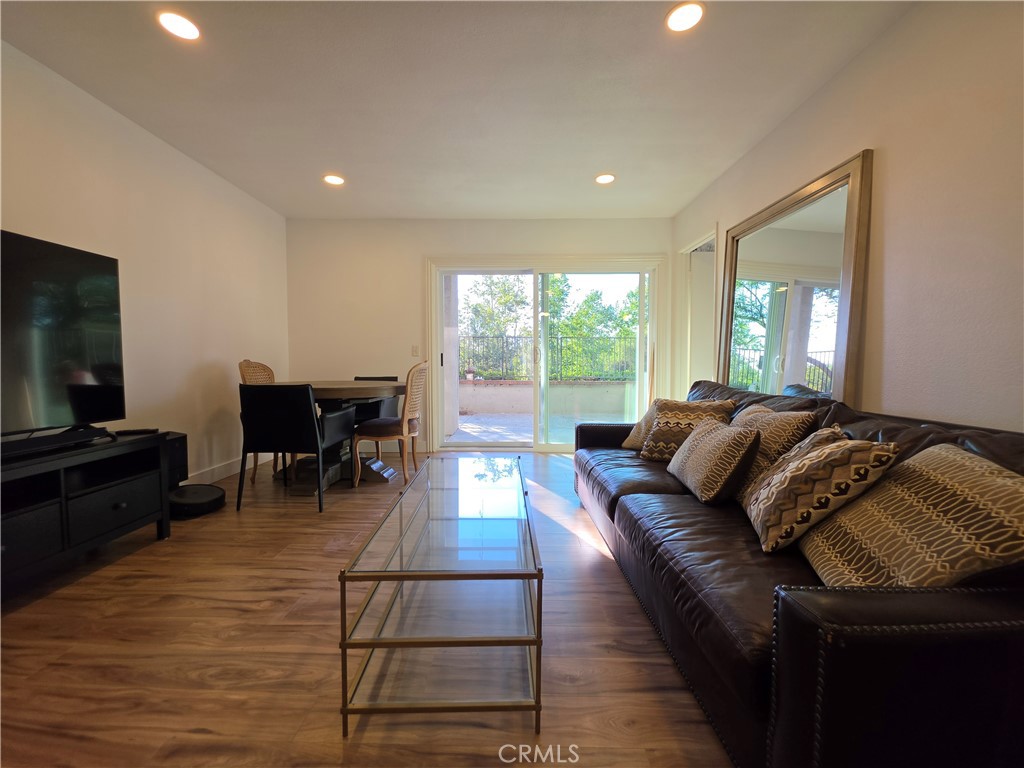 21 Rustling Wind Irvine, CA 92612 - Photo 1 of 32 living room with extendible dining table